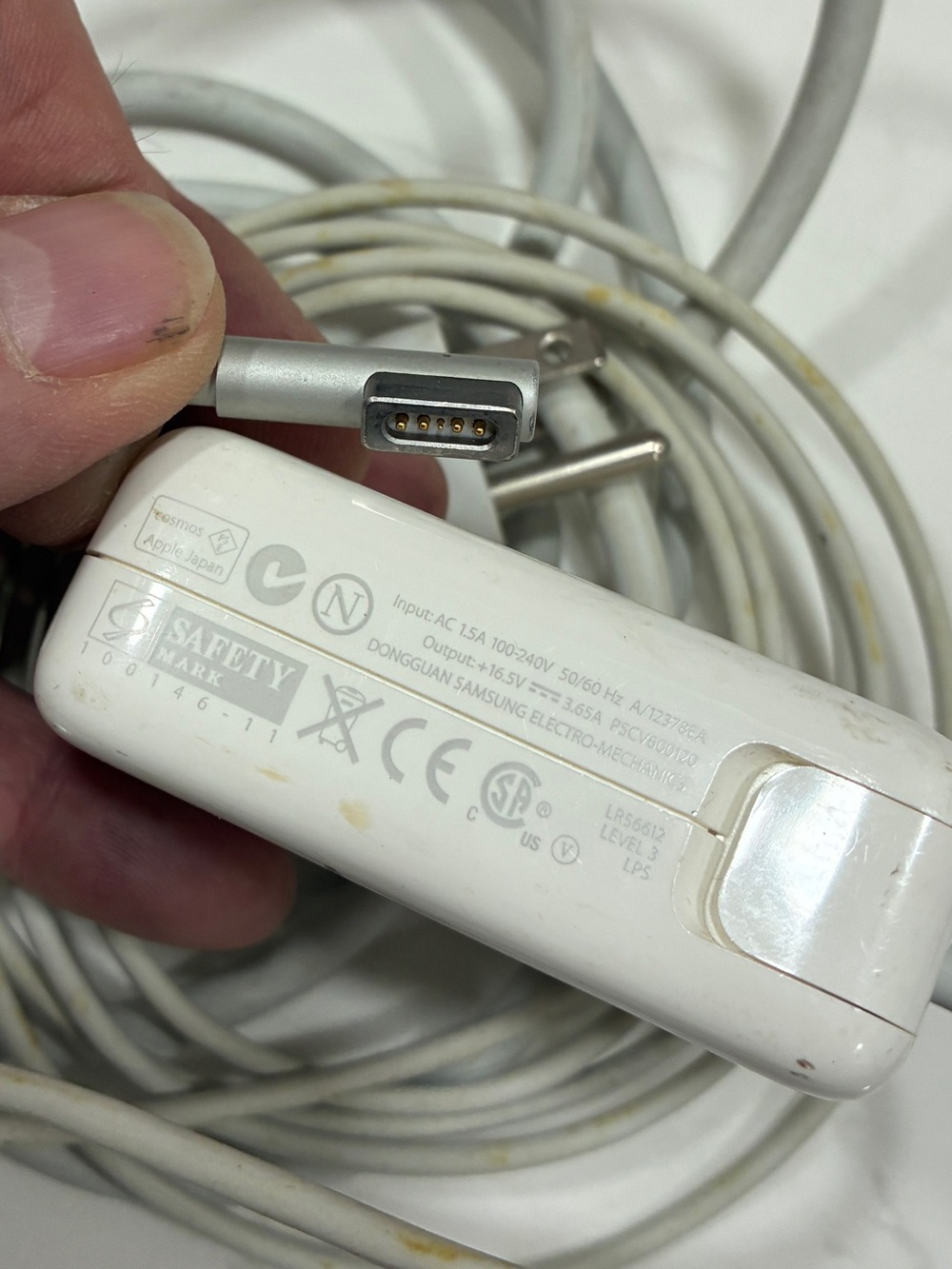 PSCV600120 is an Apple 60W MagSafe 1 power adapter